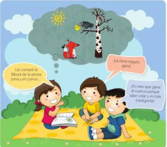 Tres niños sobre manta leyendo y debatiendo.
