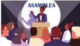 Asamblea con mujer indígena/afro hablando en público.