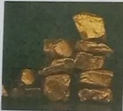 Fotografía de pepitas de oro.
