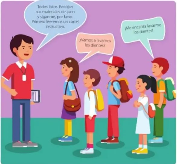 Profesor con grupo de estudiantes con sus cepillos.