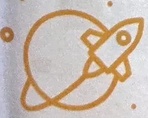Pequeña ilustración de un planeta con anillo (Saturno estilizado).